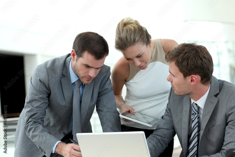 Group of business people meeting around table Group of business people meeting around table