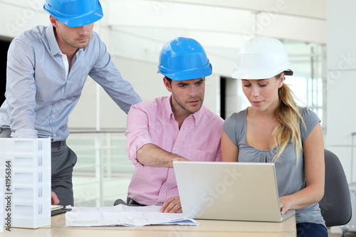 Team of architects working in office