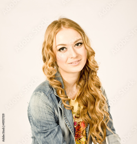 Portrait of a beautiful young woman in studio