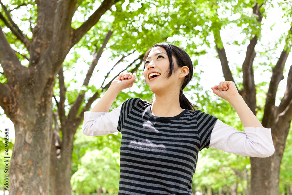 young asian woman relaxing in the forest young asian woman relaxing in the forest