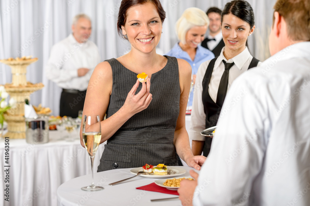 Business woman eat dessert from catering service Business woman eat dessert from catering service