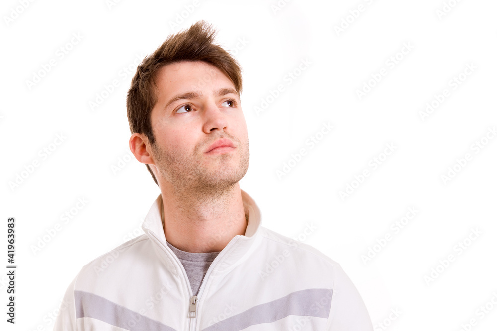 Thinking young man looking up on white background Thinking young man looking up on white background