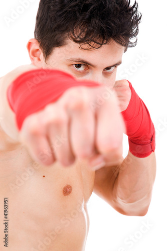 Young MMA fighter close up portrait, isolated on white