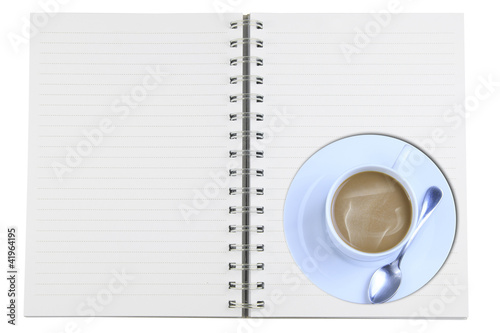 Notebooks, coffee mugs isolated on white.