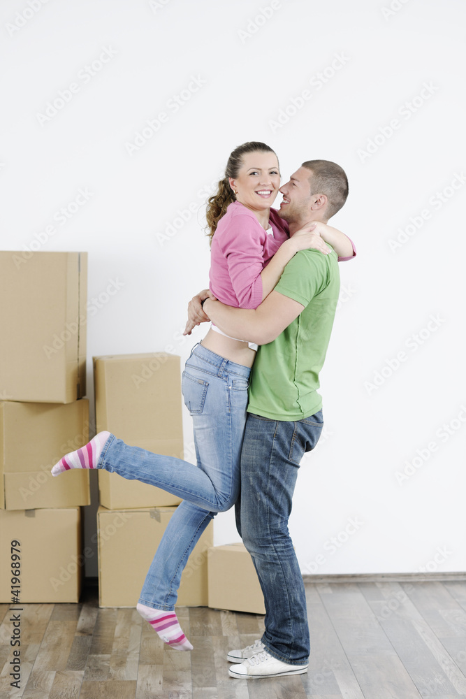 Young couple moving in new home