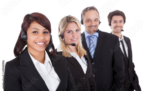 Confident business team with headsets