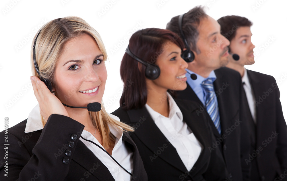 Confident business team with headsets Confident business team with headsets