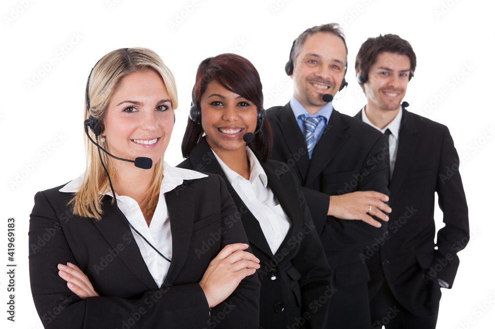 Confident business team with headsets Confident business team with headsets