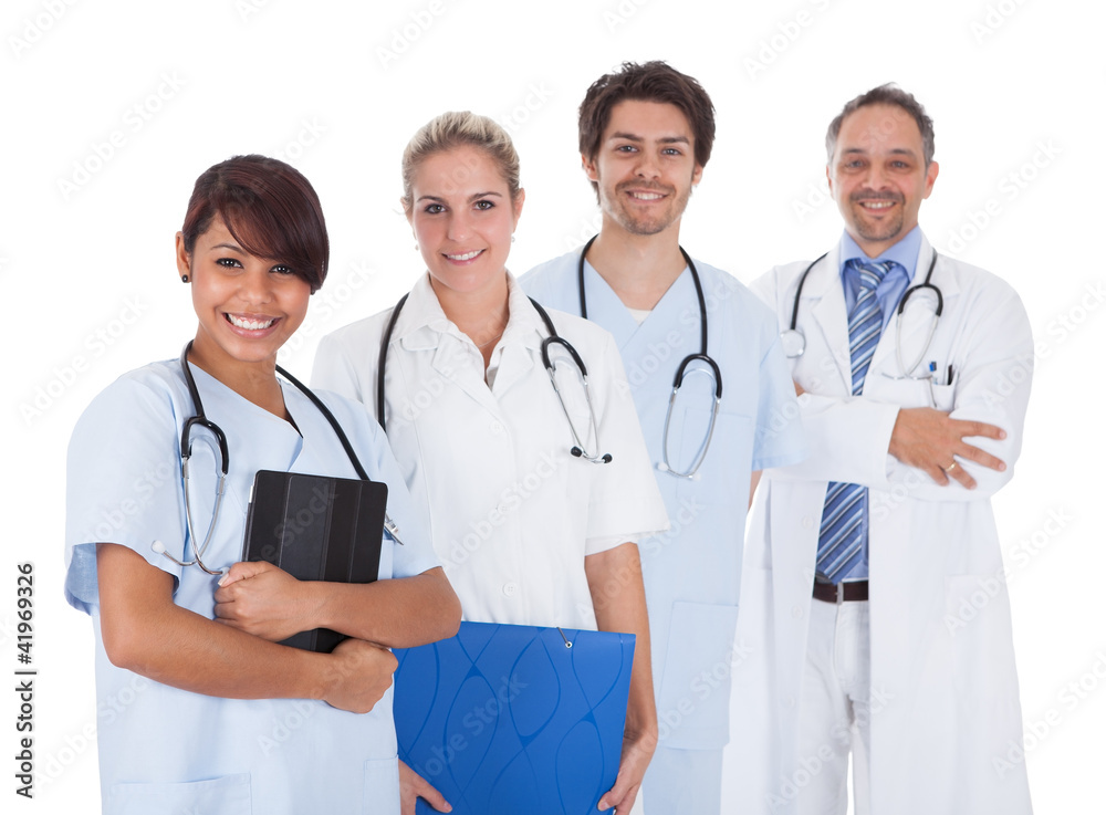 Group of doctors standing together over white Group of doctors standing together over white