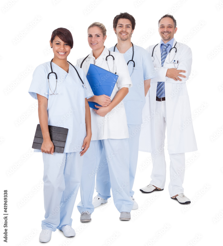 Group of doctors standing together over white Group of doctors standing together over white