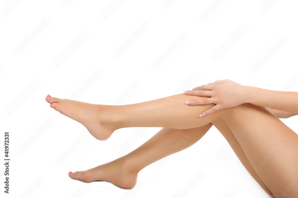 legs bieng massaged with hands isolated legs bieng massaged with hands isolated