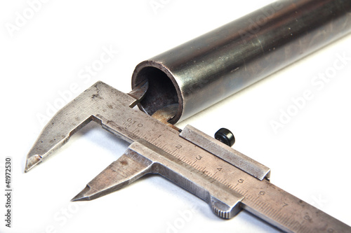measuring of old hunting punt gun muzzle with vernier callipers