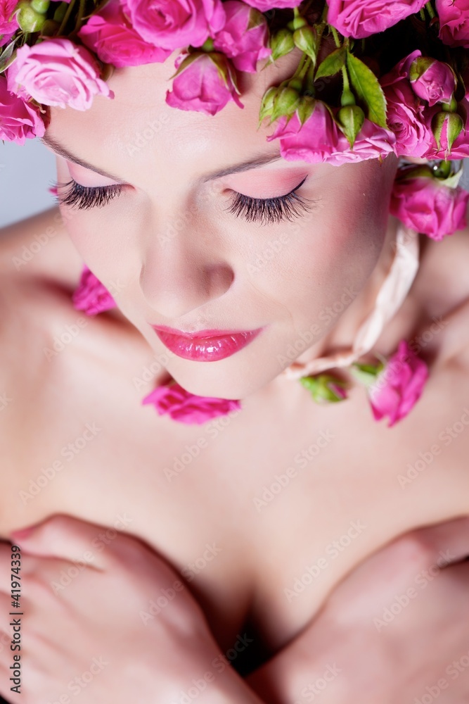 Girl with roses in hair Girl with roses in hair