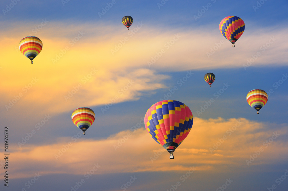 Colorful balloons with dramatic sky