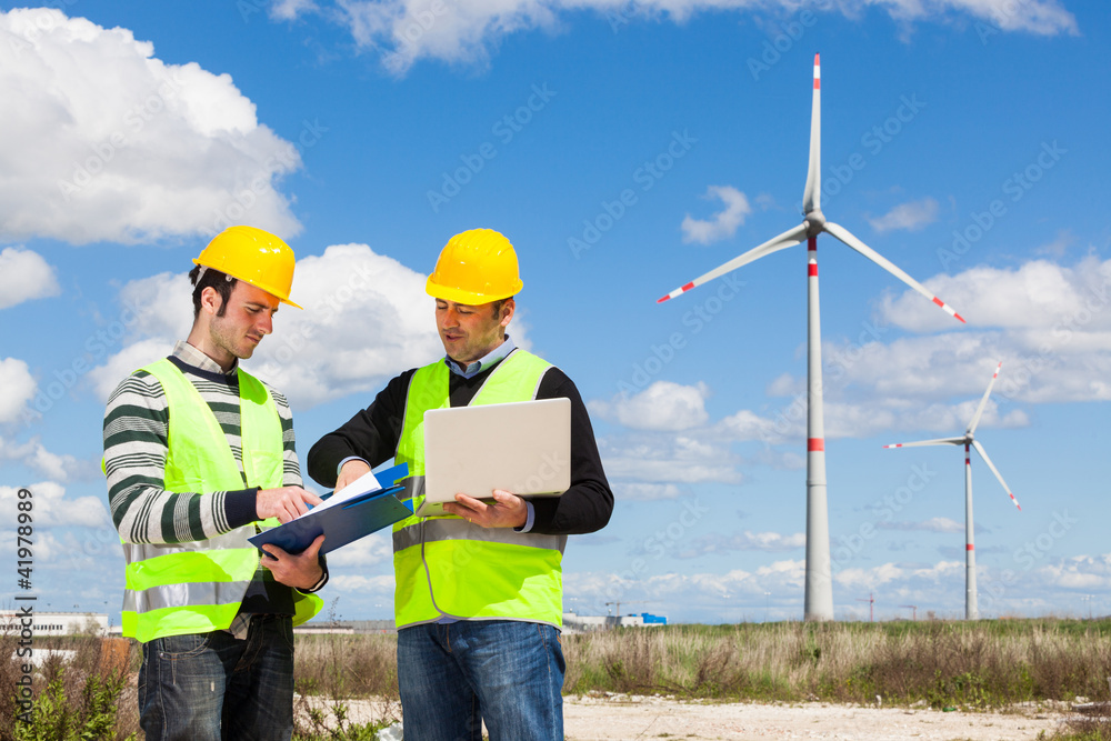 Two Engineers in a Wind Turbine Power Station