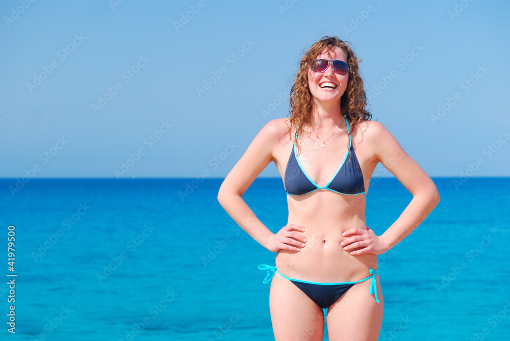 beautiful woman against the sea background