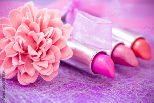 glamour lipsticks and flower petals