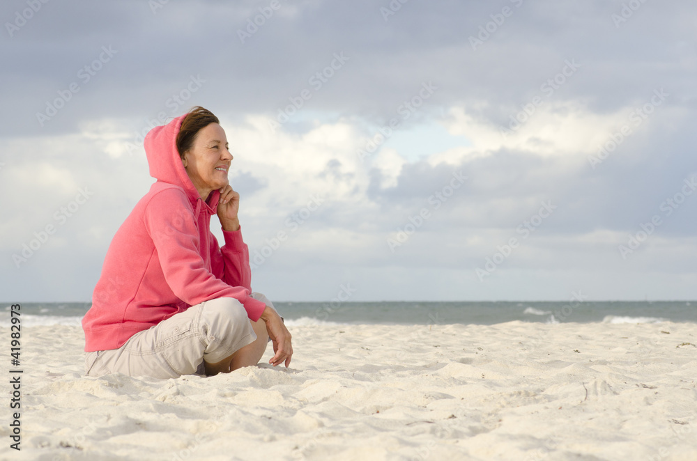 Lonely woman and bad weather at beach Lonely woman and bad weather at beach
