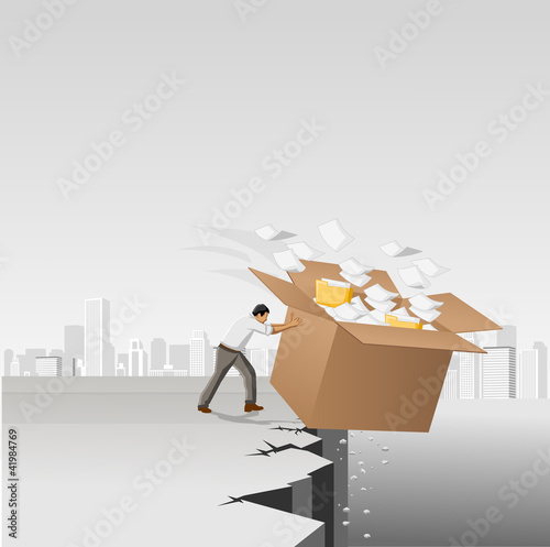 Businessman throwing away a box with papers and files