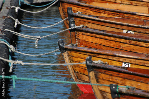 Moored rowing attached to jetty