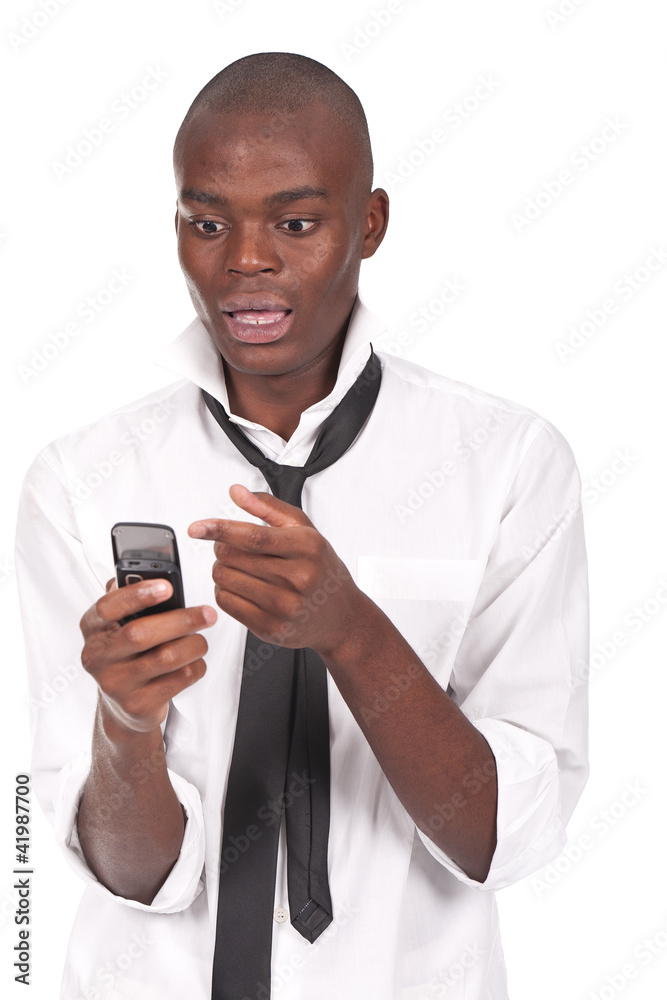 man holding a cellphone and looking surprised man holding a cellphone and looking surprised