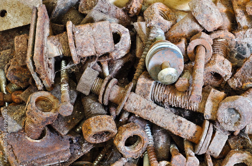 closeup on rusty screws, nuts and bolts closeup on rusty screws, nuts and bolts
