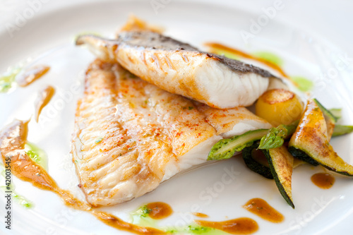 Grilled turbot fish with vegetables.