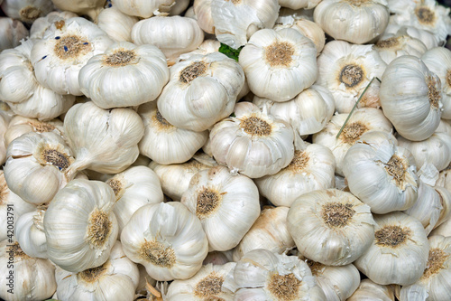 Garlic bulbs on a market stall