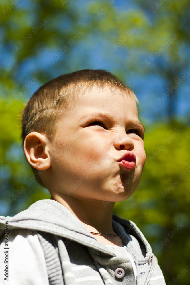 Close up portrait of a beautiful kid outdoor Close up portrait of a beautiful kid outdoor