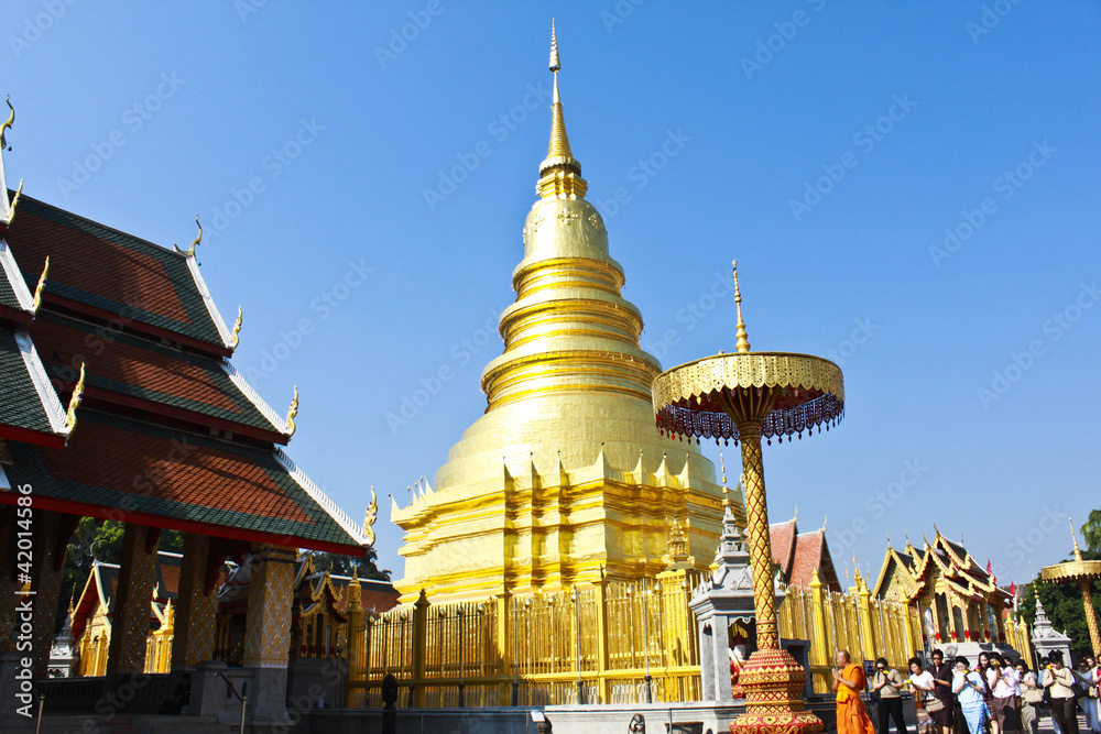 Naklejka premium Golden Pagoda at Wat Phra That Hariphunchai , Lamphun Province,