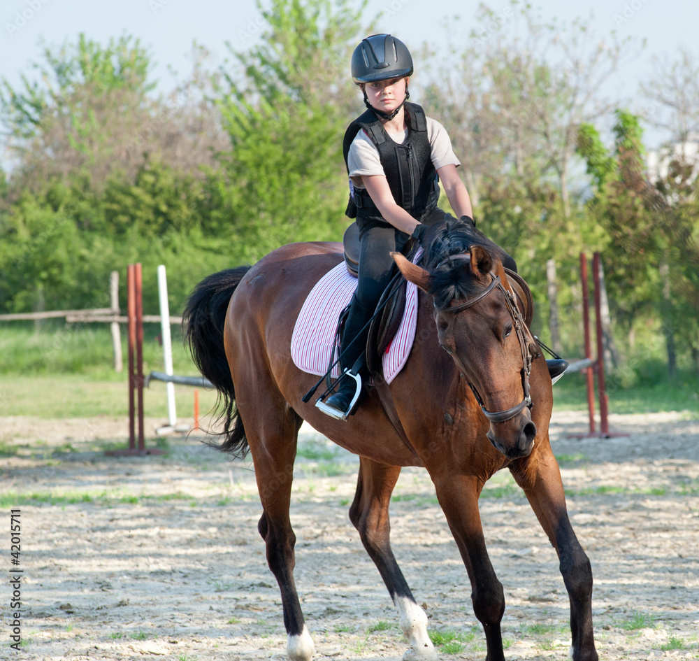 girl riding a horse