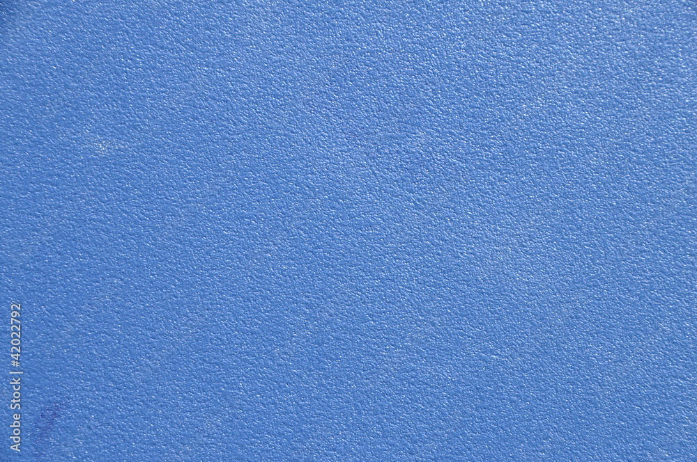 Blue painted wall with roughcast for background or texture Blue painted wall with roughcast for background or texture