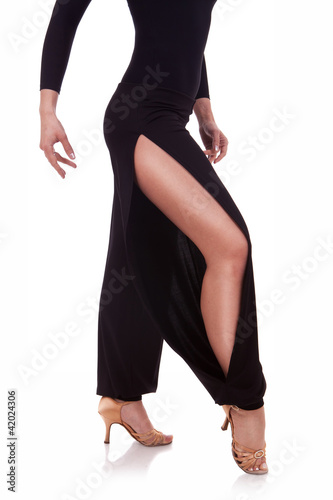 legs of a young woman salsa dancer