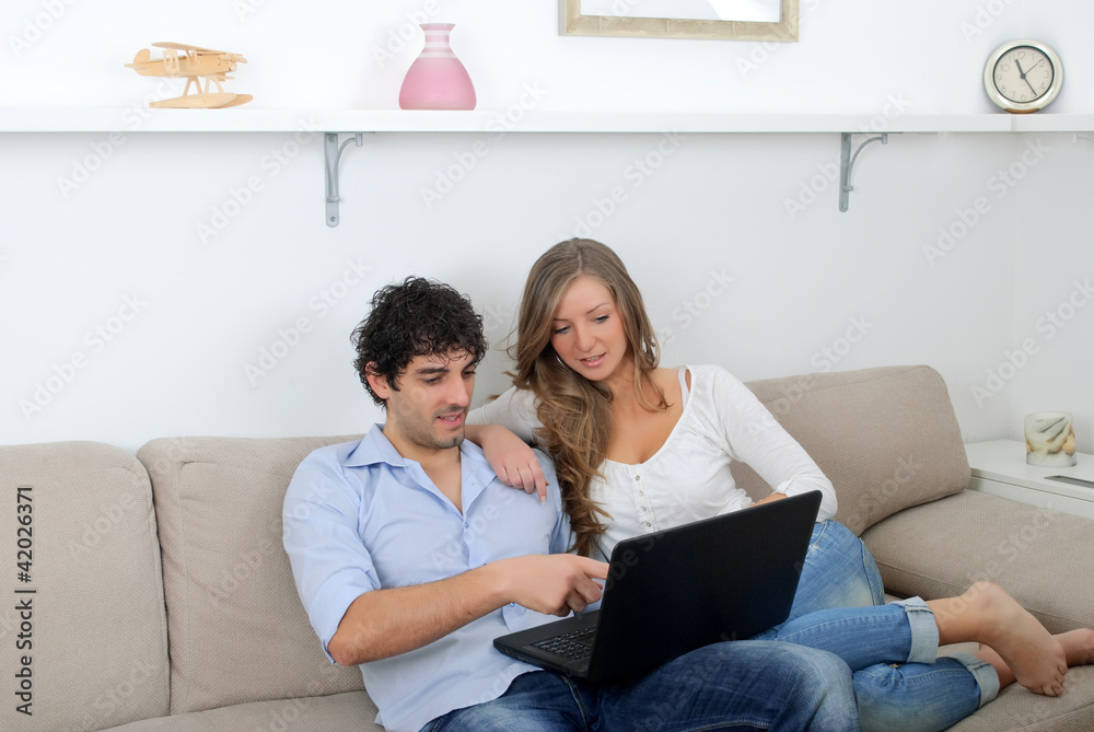 young couple with laptop young couple with laptop