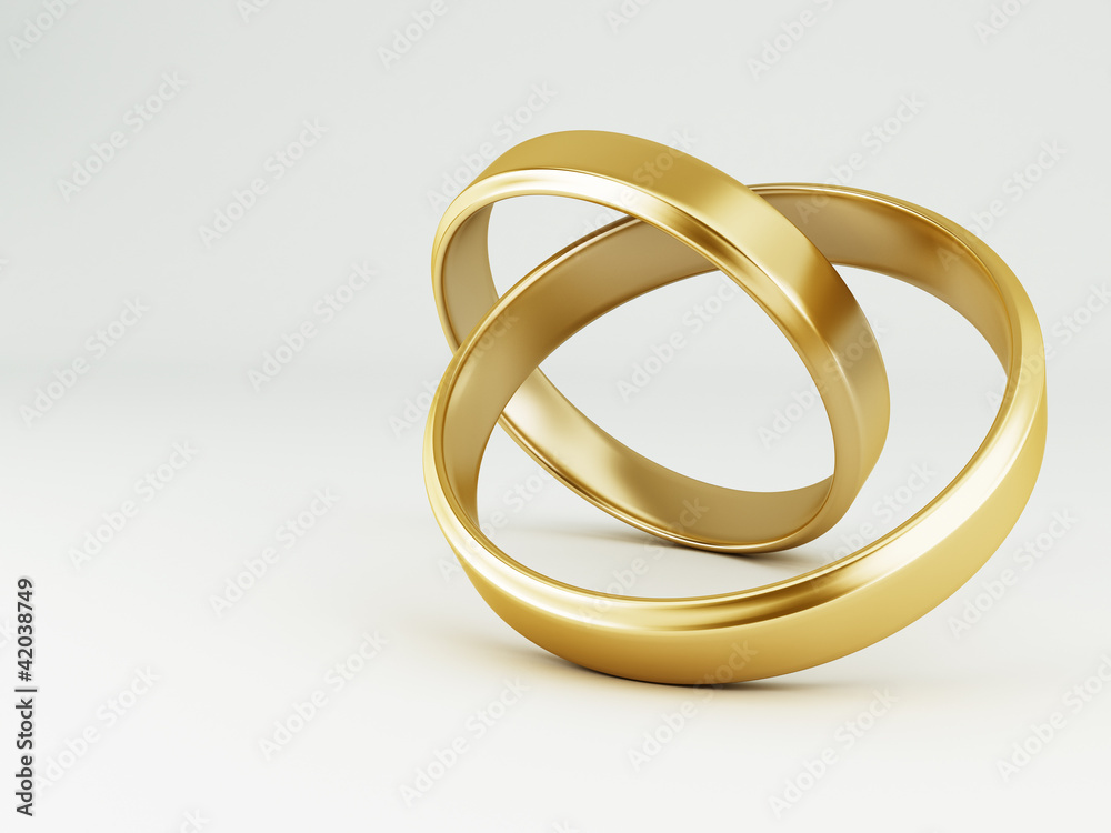 The beauty wedding gold rings on white background The beauty wedding gold rings on white background