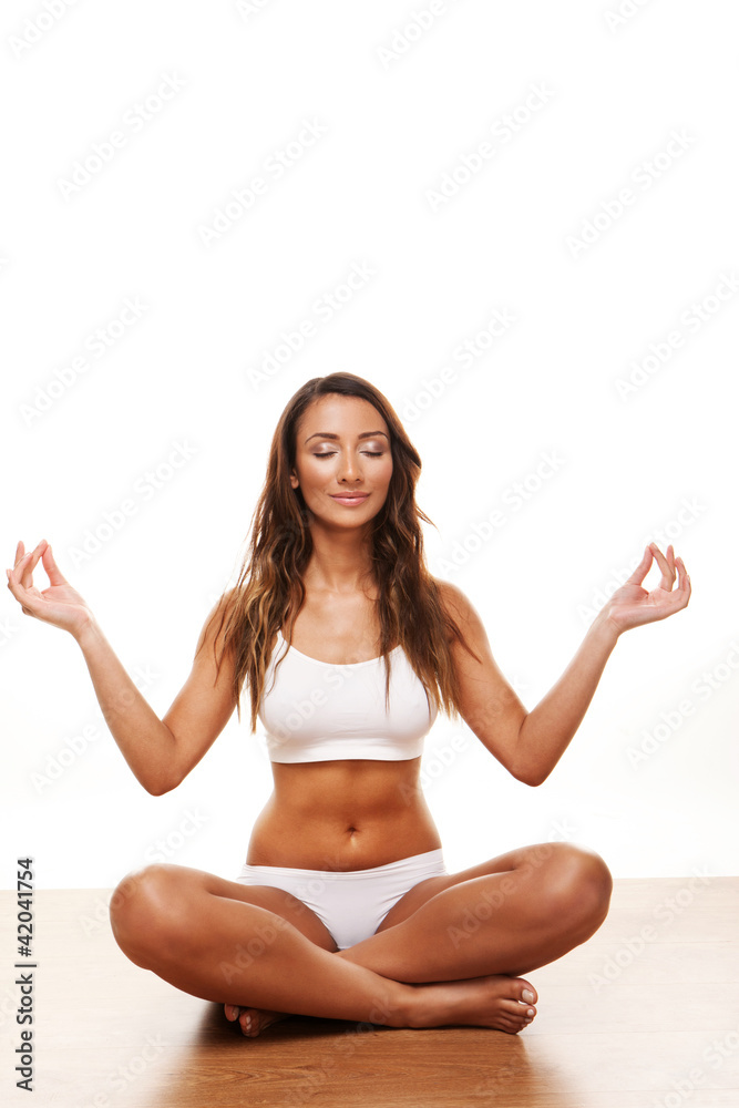 Young attractive female doing yoga Young attractive female doing yoga
