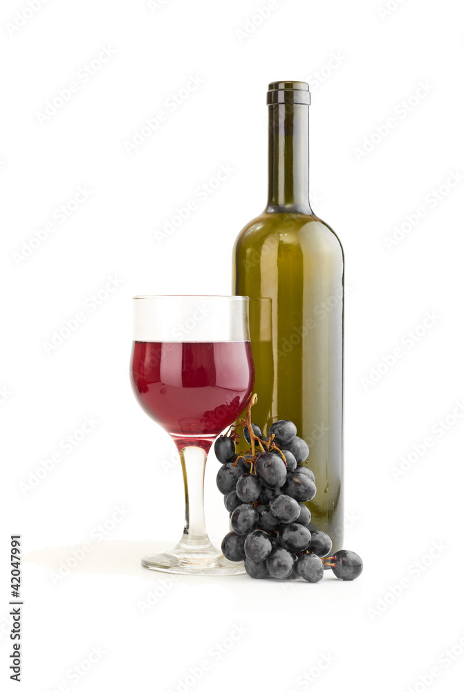 Glass of red wine and a bottle isolated over white background