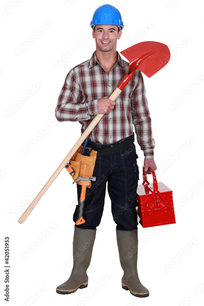 Manual worker holding spade Manual worker holding spade