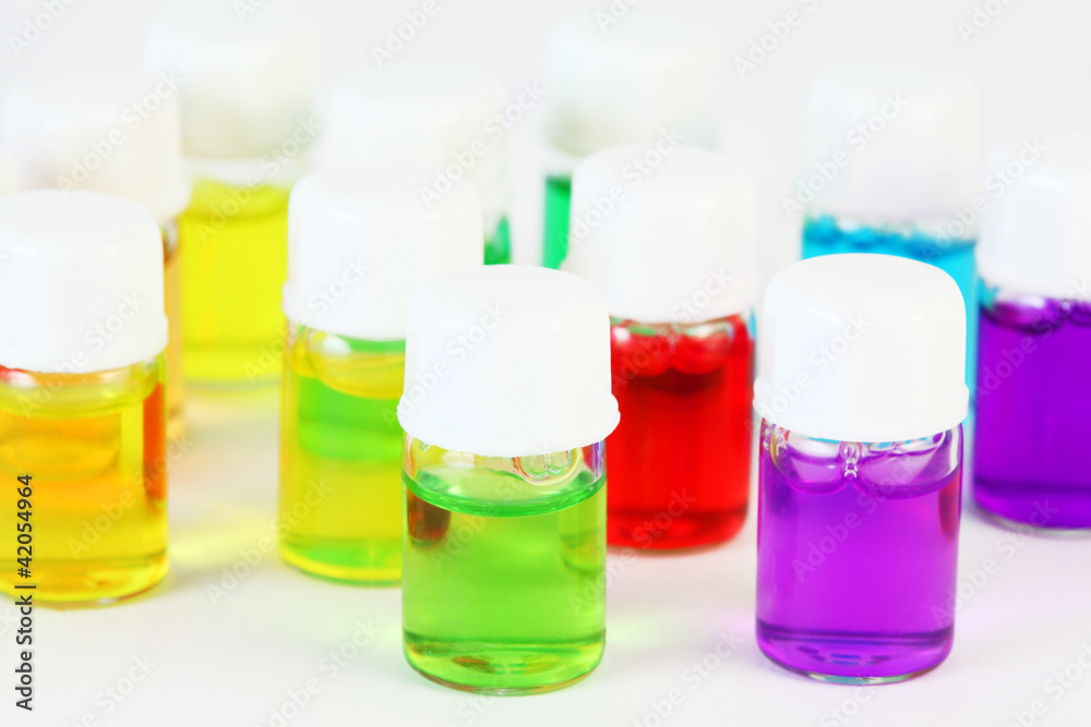 Small bottles of different colored aromatic oils