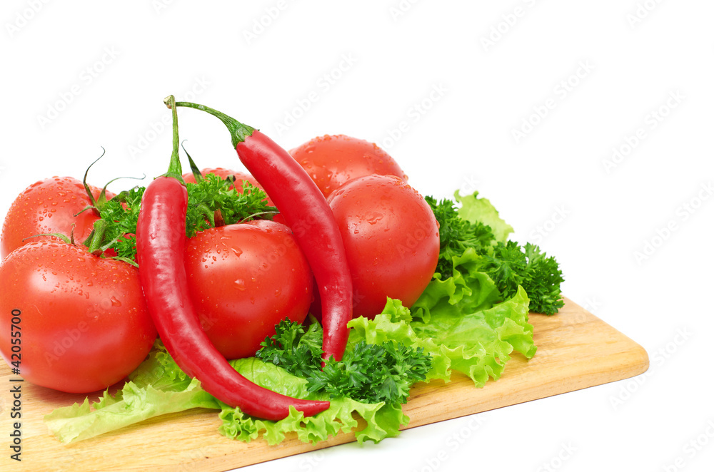 Composition with raw vegetables on kitchen table