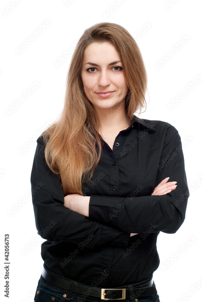 a young girl standing with his arms folded.smiles. a young girl standing with his arms folded.smiles.