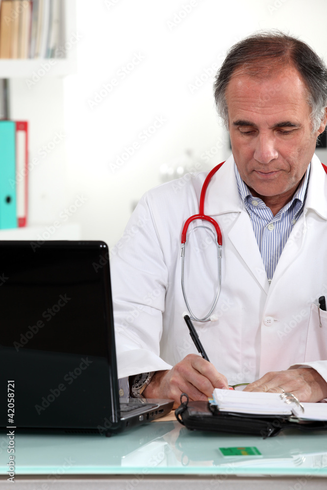 Writing a prescription. Writing a prescription.