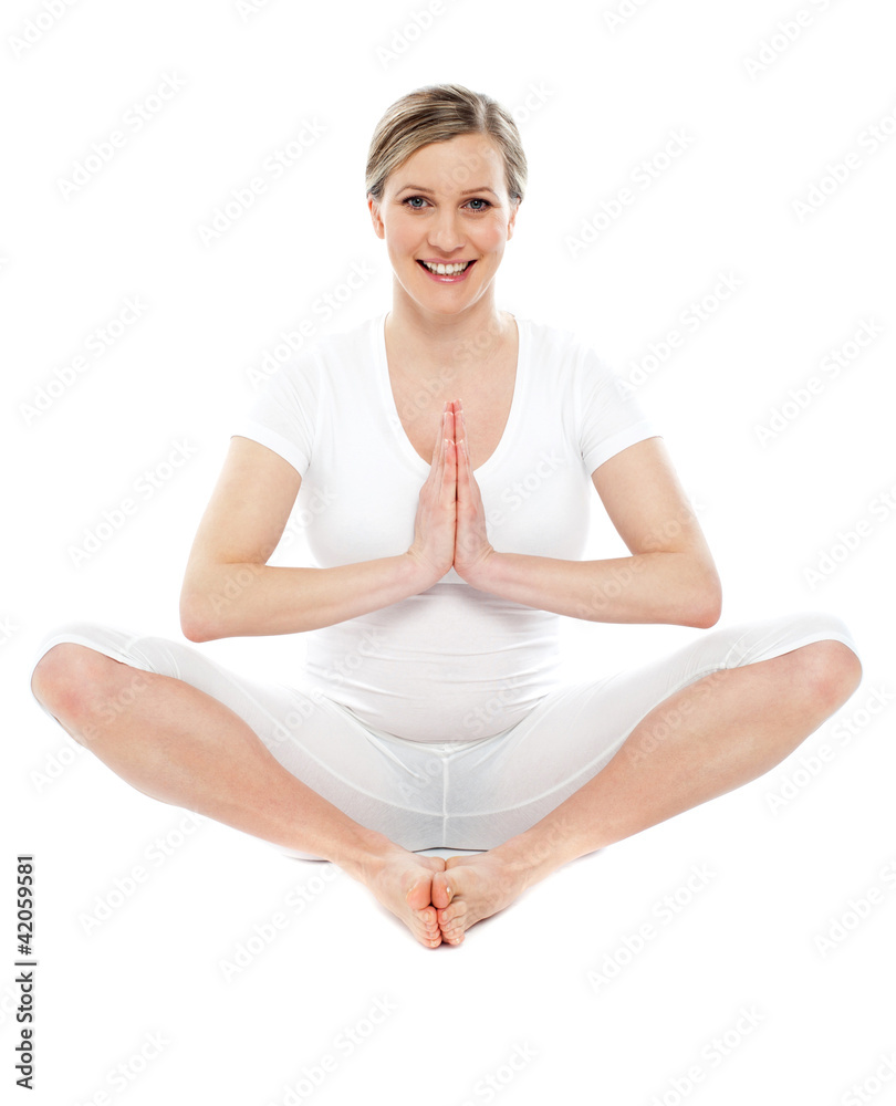 Young attractive pregnant woman doing yoga Young attractive pregnant woman doing yoga