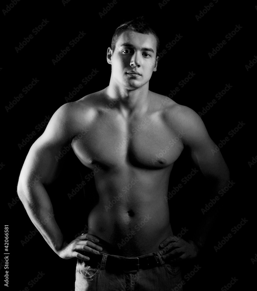 Fototapeta premium Bodybuilder showing his muscles