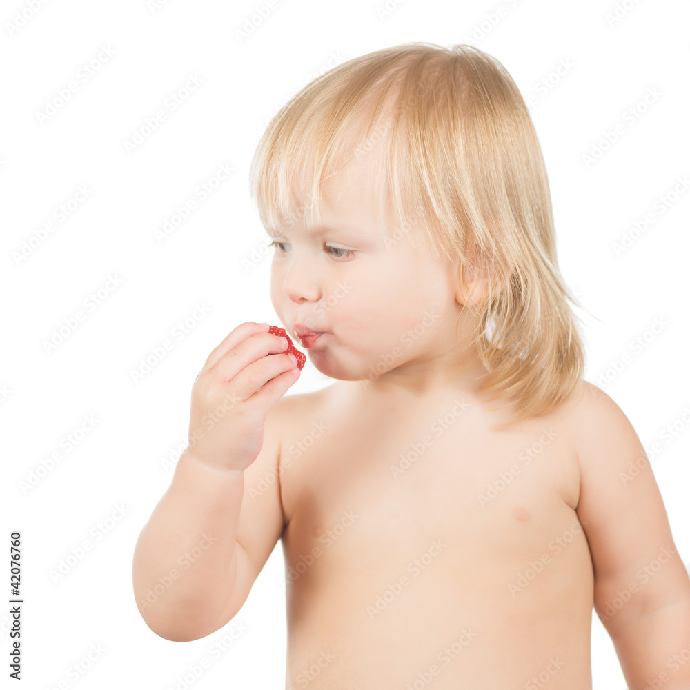 Adorable toddler girl eat strawberry sitting on white background Adorable toddler girl eat strawberry sitting on white background