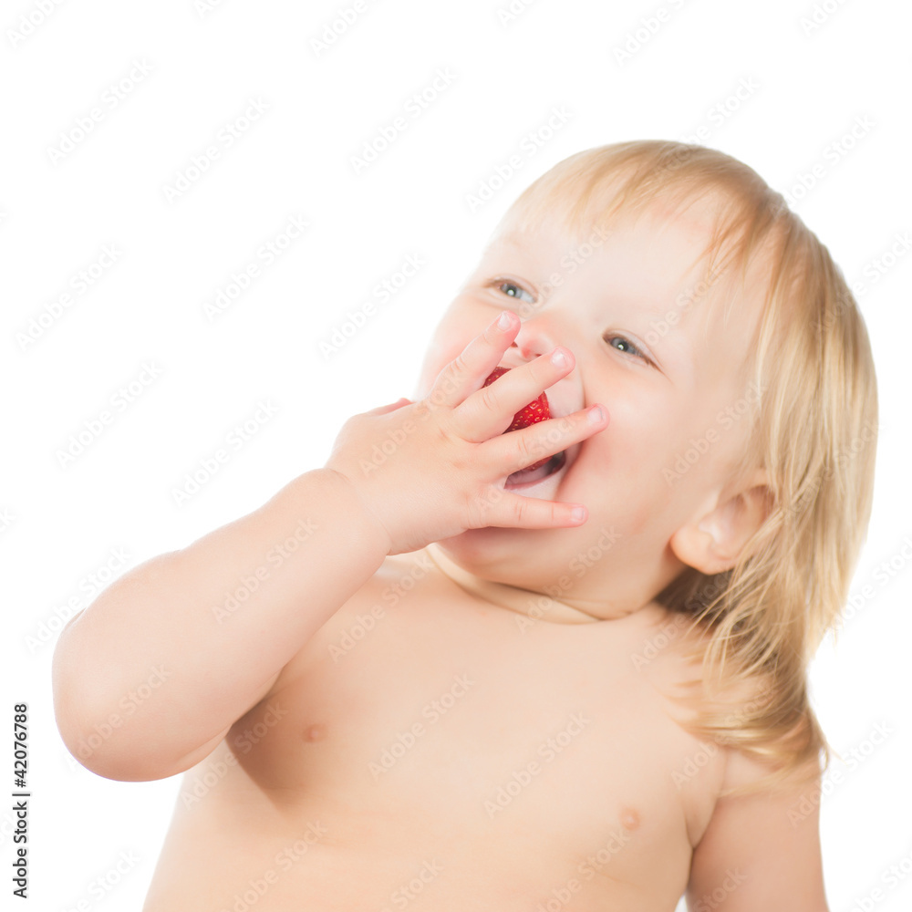 Adorable toddler girl eat strawberry sitting on white background Adorable toddler girl eat strawberry sitting on white background