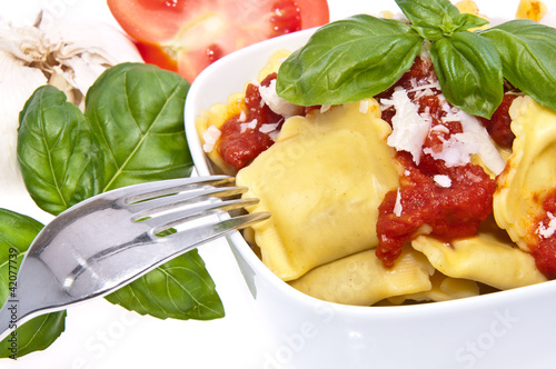 Bowl with Raviolis isolated on white