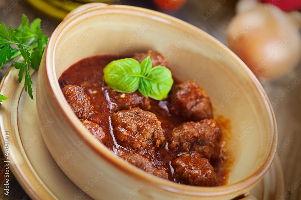 Italian cooking  - meat balls with basil