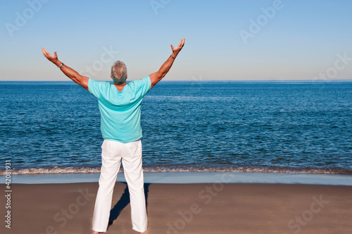Man with arms outstretched