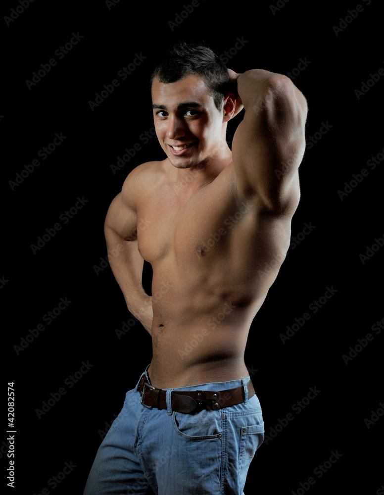 Fototapeta premium Bodybuilder showing his muscles